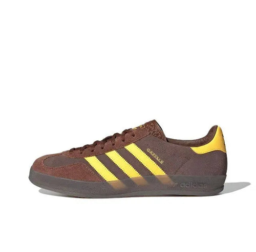 Adidas Gazelle Indoor sneakers in brown with yellow three stripes