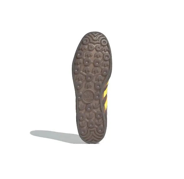 Adidas Gazelle Indoor rubber outsole with circular tread and yellow heel stripe