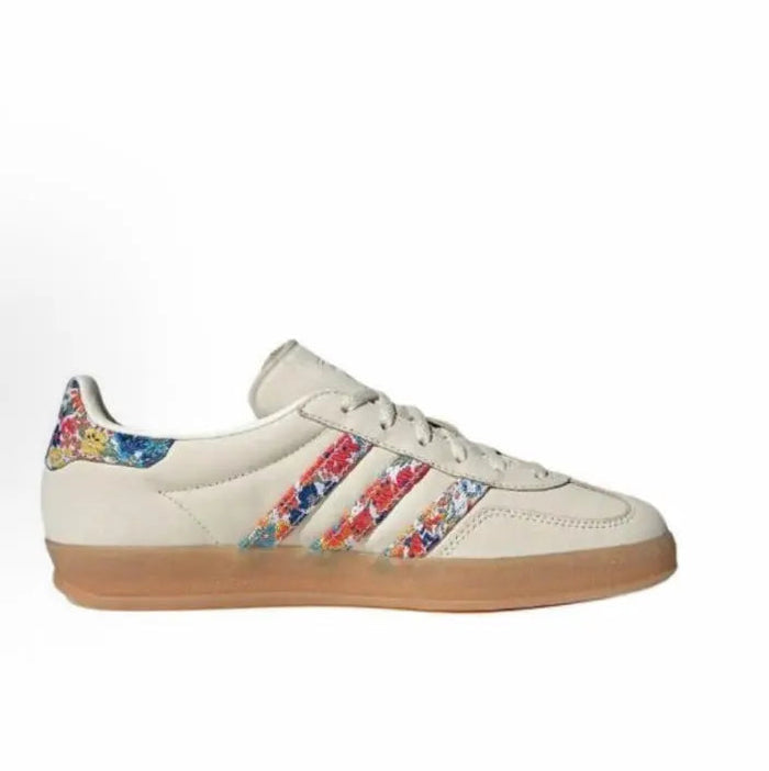 Adidas Gazelle Indoor sneakers, side view with floral 3-Stripes and gum sole