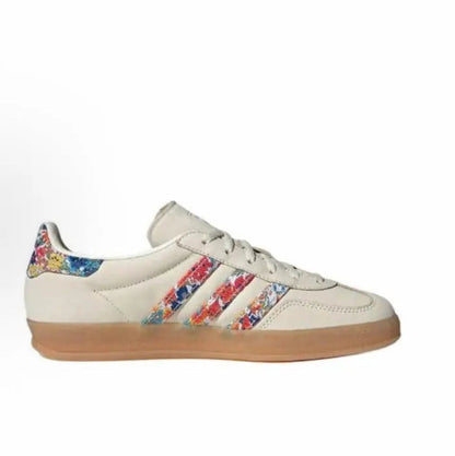 Adidas Gazelle Indoor sneakers, side view with floral 3-Stripes and gum sole