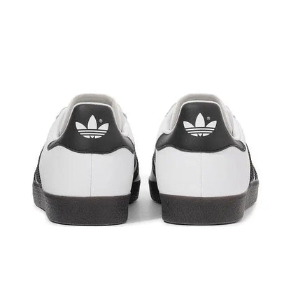 Gazelle Indoor sneakers, white leather with black heel counter and ribbed sole