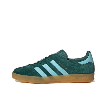 Dark green suede sneakers with light blue 3-Stripes and gum sole