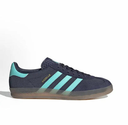 Adidas Gazelle Indoor low-top sneaker in dark navy with turquoise stripes, black laces, gum sole.