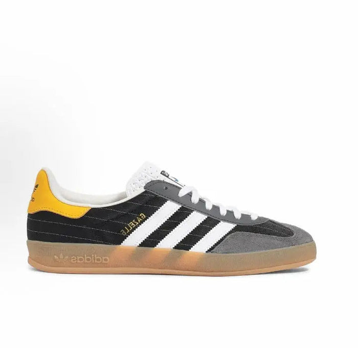 Adidas Gazelle indoor sneakers, black suede, white stripes, yellow collar, gum sole