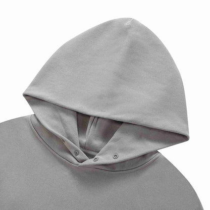 Grey hoodie with hood and button placket at neckline.