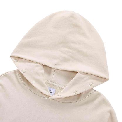 Beige hoodie with hood lining and snap-button placket detail at neckline