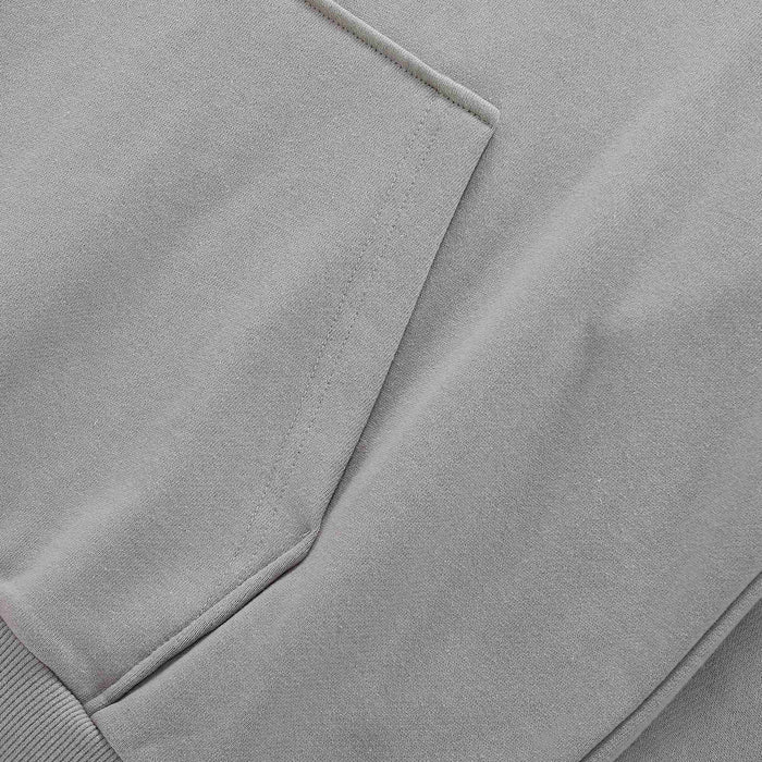 Grey hoodie front with kangaroo pocket opening and clean stitched edge.