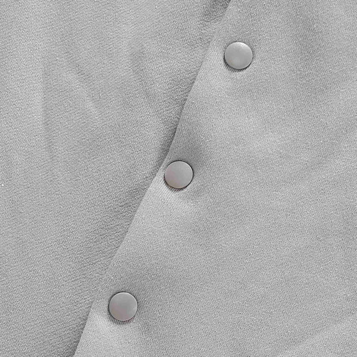 Gray hoodie neckline placket with three round snap buttons