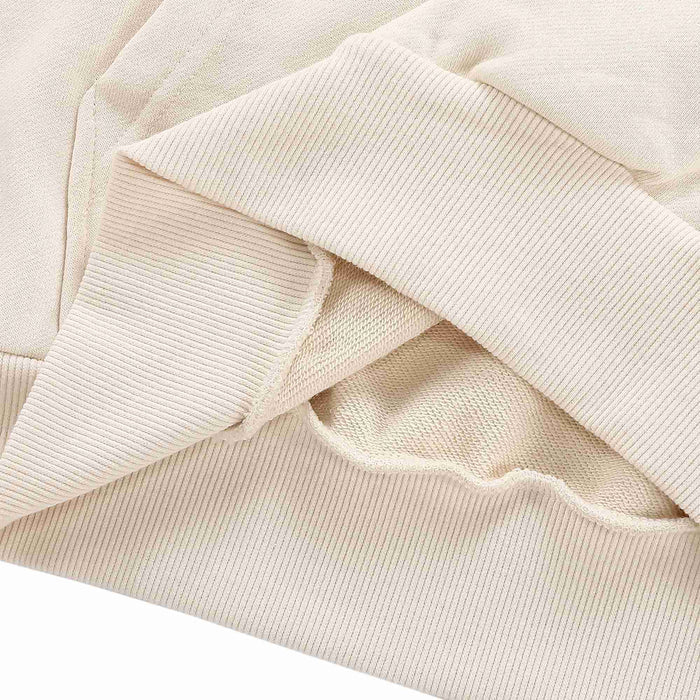 Beige hoodie ribbed knit cuffs and hem detail on sweatshirt fabric