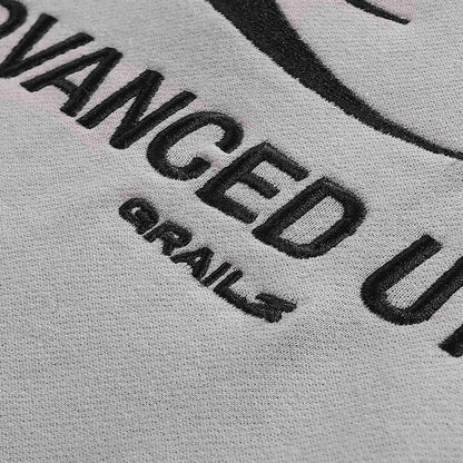 Gray hoodie chest text 'ADVANCED UTILITY' and logo mark