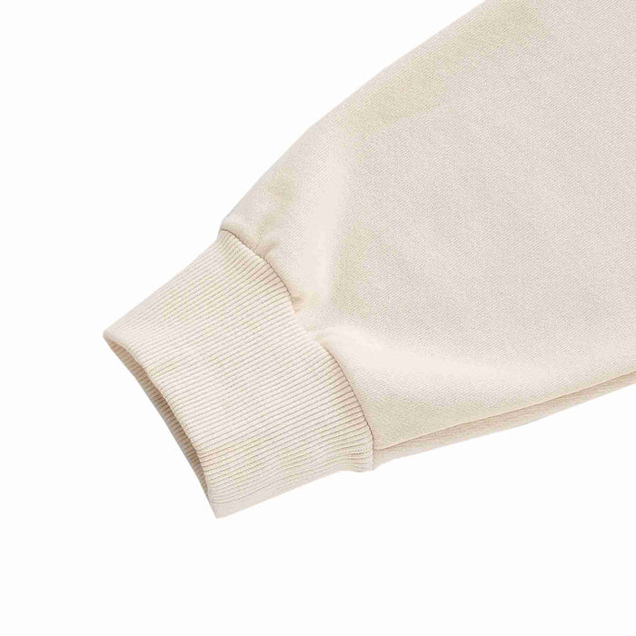 Beige hoodie sleeve cuff with ribbed knit hem