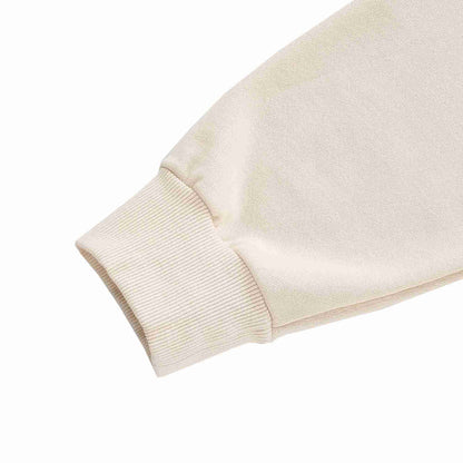 Beige hoodie sleeve cuff with ribbed knit hem
