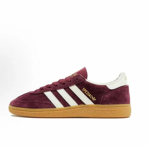 Adidas Handball Spezial sneakers in burgundy suede with white three stripes and gum sole