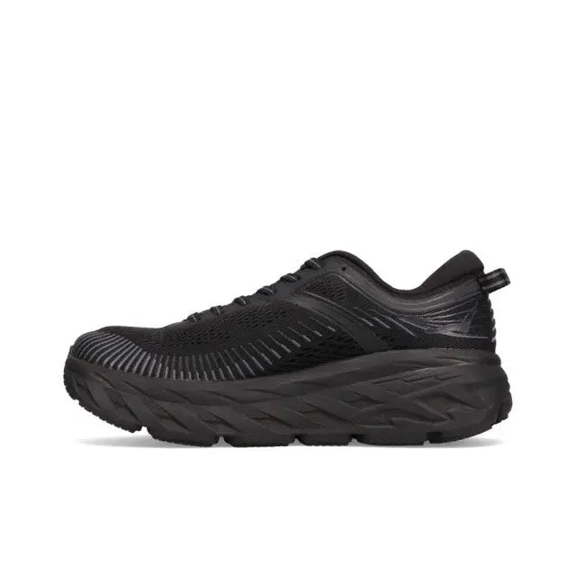 Black running shoe with knit upper, lace-up, and thick cushioned sole