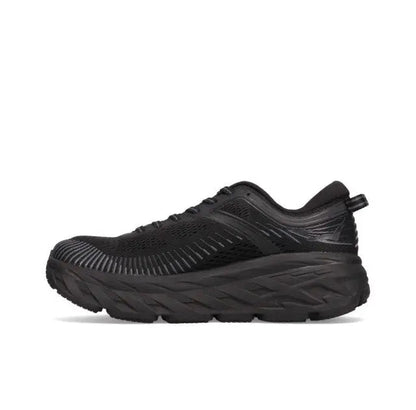 Black running shoe with knit upper, lace-up, and thick cushioned sole