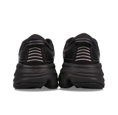 Black running shoe heel with cushioned midsole and striped heel overlays