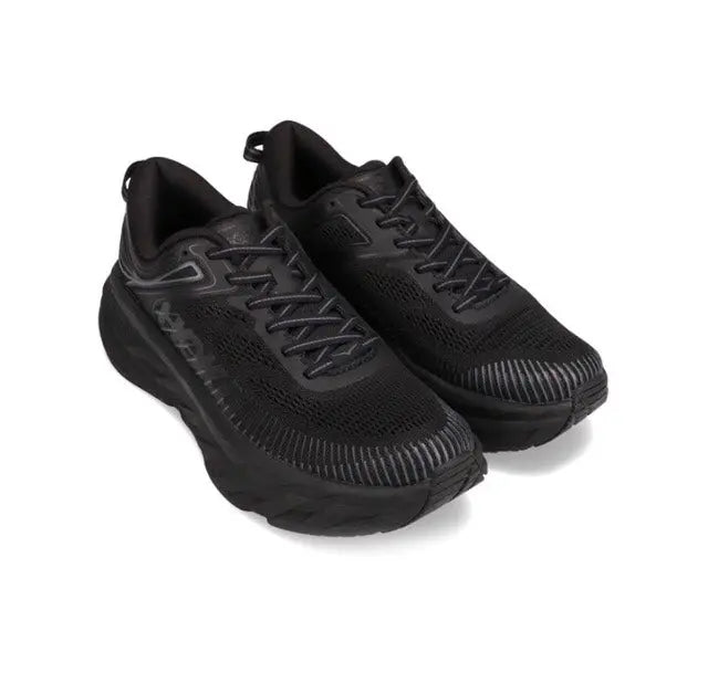 Black running shoe pair with mesh upper, lace-up closure, and textured midsole