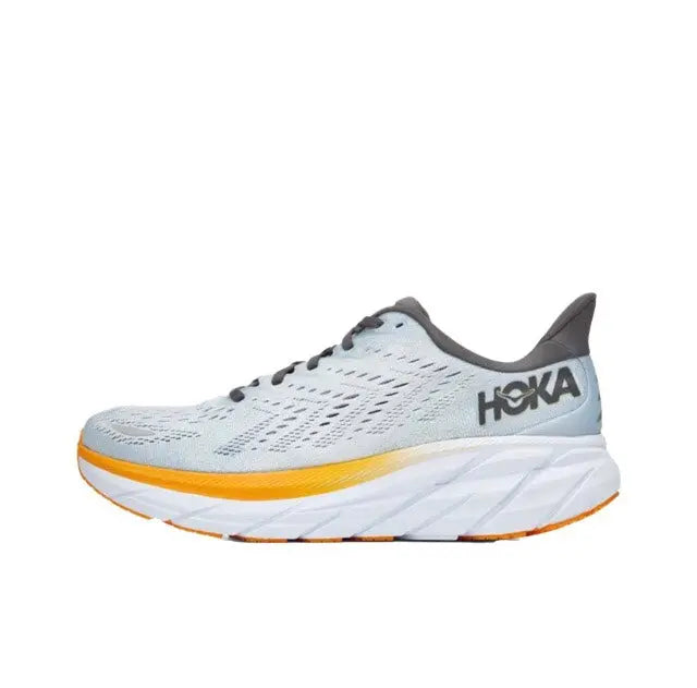 Light blue running shoe with black laces, orange-trimmed sole and Hoka logo on side