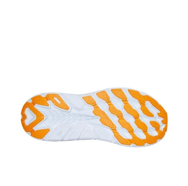 Light blue shoe outsole with orange tread pattern and white midsole