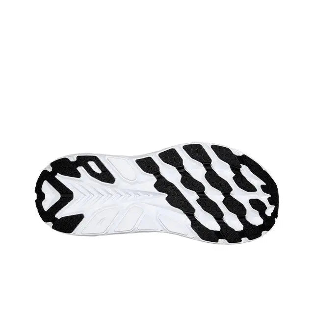 Shoe outsole, black rubber tread with white midfoot section