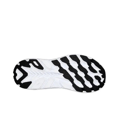 Shoe outsole, black rubber tread with white midfoot section