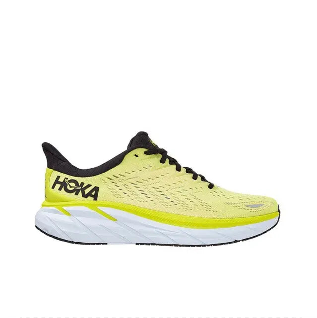 Running shoe with lime yellow upper, black heel collar, and white midsole
