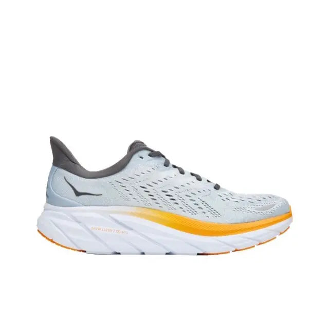 Light blue running shoe with black laces, orange sole edge, side logo