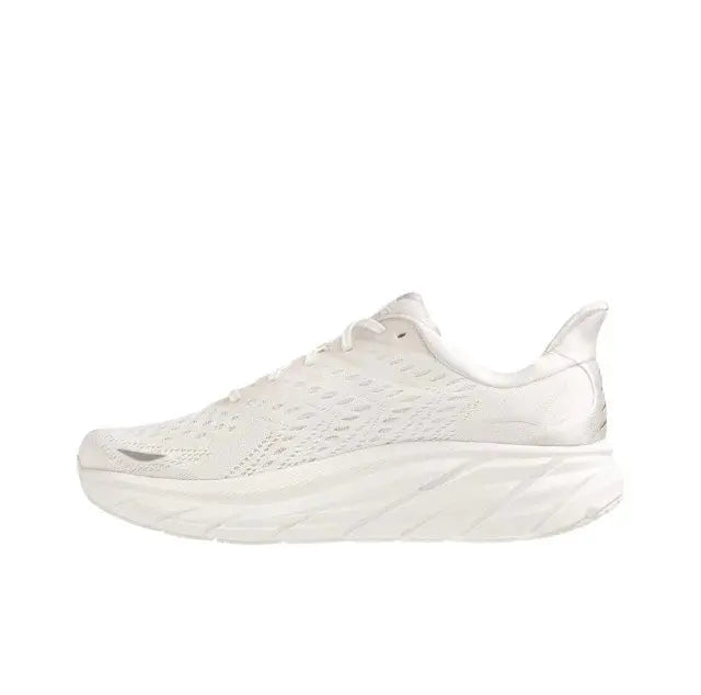 White low-top running shoe with textured knit upper and thick foam sole