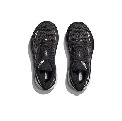Pair of black lace-up running shoes viewed from top, HOKA branding on uppers