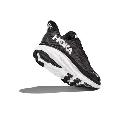 Black HOKA running shoe with lace-up front and white midsole in side profile
