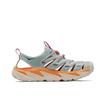 Hoka Hopara athletic shoe in light gray with teal panels, orange accents, fuchsia laces