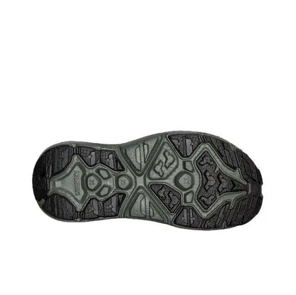 Trail sandal outsole with molded tread in dark gray and olive-green