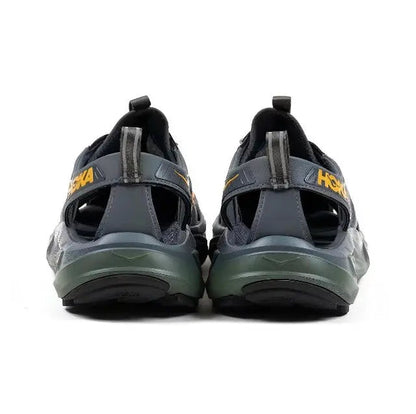 Trail sandal back view with dark navy straps and olive-green heel cushion