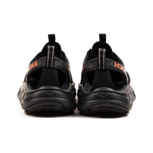 Trail shoe heels, black with rear pull tabs and cushioned rubber sole