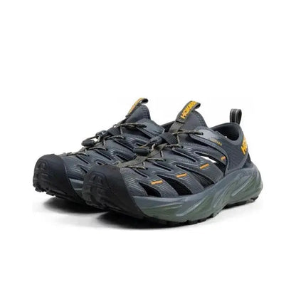 Hoka Hopara trail sandal in dark navy with yellow accents and olive-green sole