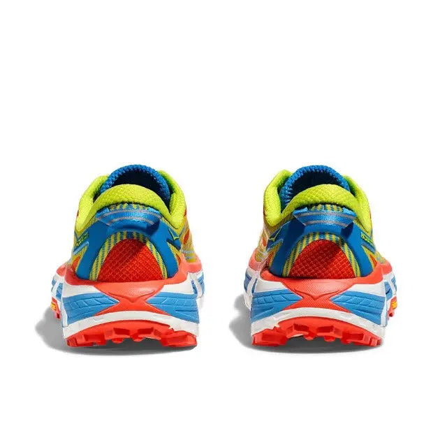 Trail running shoe heel view with blue collar, neon green lining, and red sole
