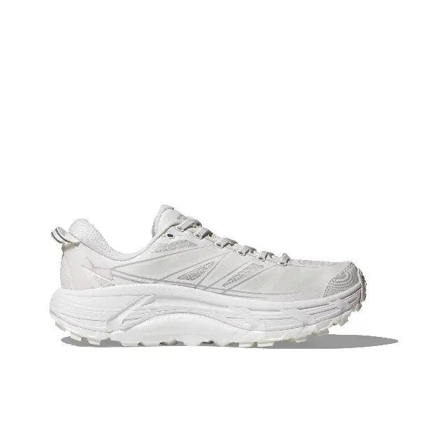 Light-colored running shoe side view with lace-up upper and textured outsole