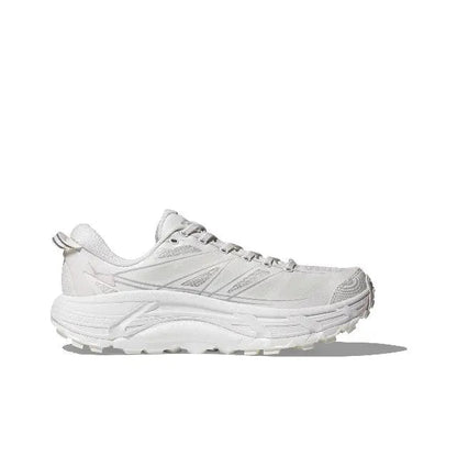 Light-colored running shoe side view with lace-up upper and textured outsole