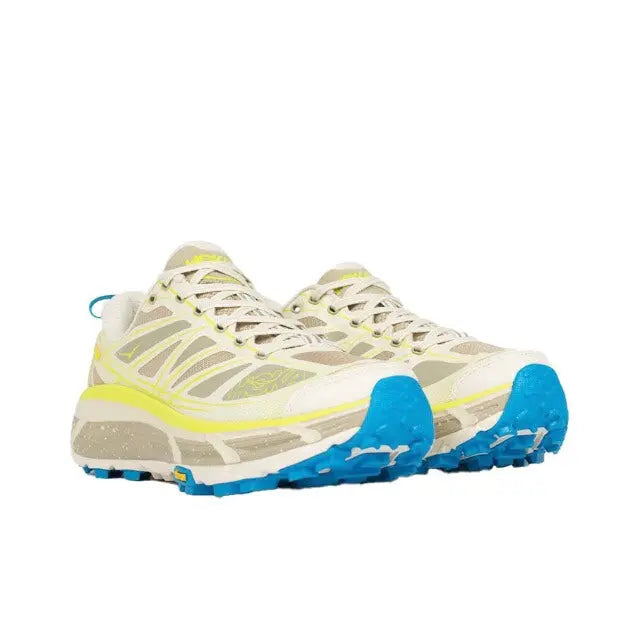 Hoka Mafate Speed 2 trail running shoe, cream upper with neon yellow lines and blue outsole