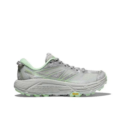 Light gray lace-up trail shoe with green sockliner and molded treaded outsole