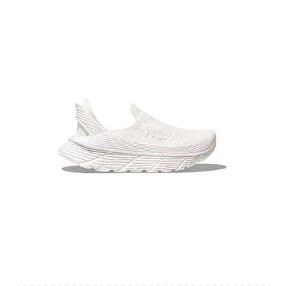 Hoka Restore TC slip-on running shoe, white mesh upper with textured midsole ridges.