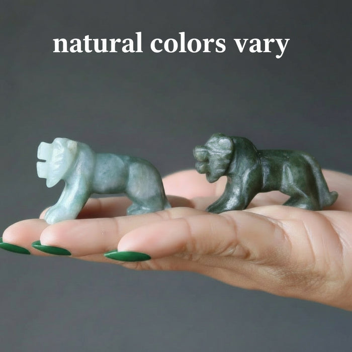 green jade tiger carvings showing natural colors vary