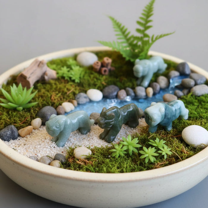 jade tigers in a mini garden