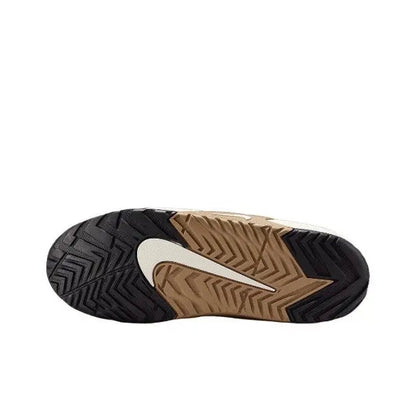 Nike Jam sneakers outsole view with dark tread and beige logo panel