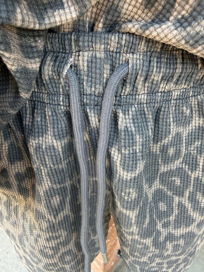 Leopard waffle knit shorts with blue-gray fabric and red drawstring detail