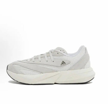 White Adidas Lightblaze low-top running shoes with lace-up front and side stripes.