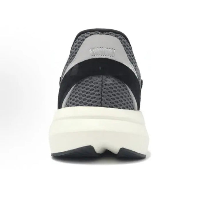 Adidas Lightblaze heel view, black/gray mesh with white cushioned sole