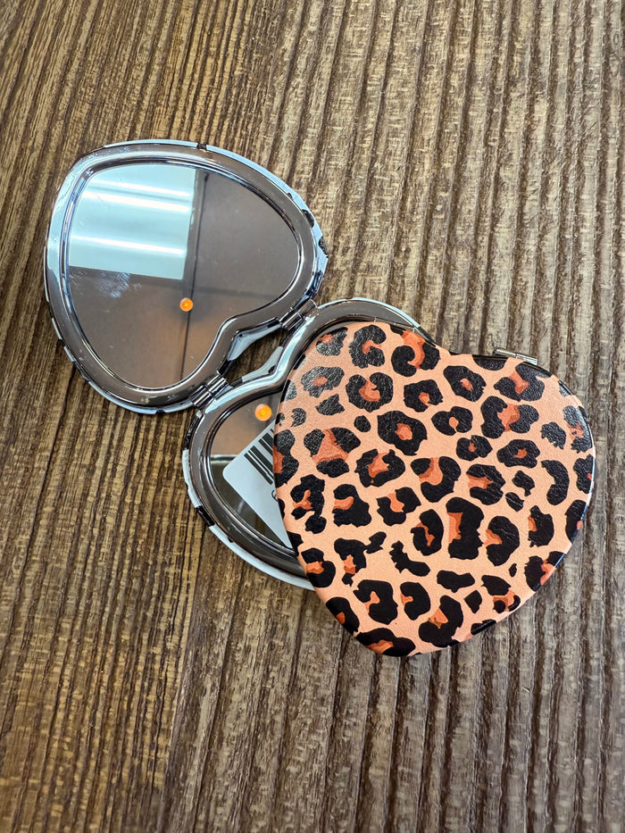 Leopard heart mirror compact with round mirror and hinged case, silver trim