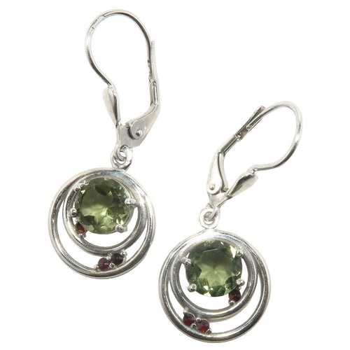 faceted green moldavite and red garnets in circular sterling silver earring