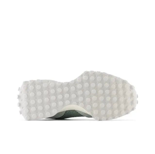 New Balance MS327 sneaker outsole with textured tread, grey and white.